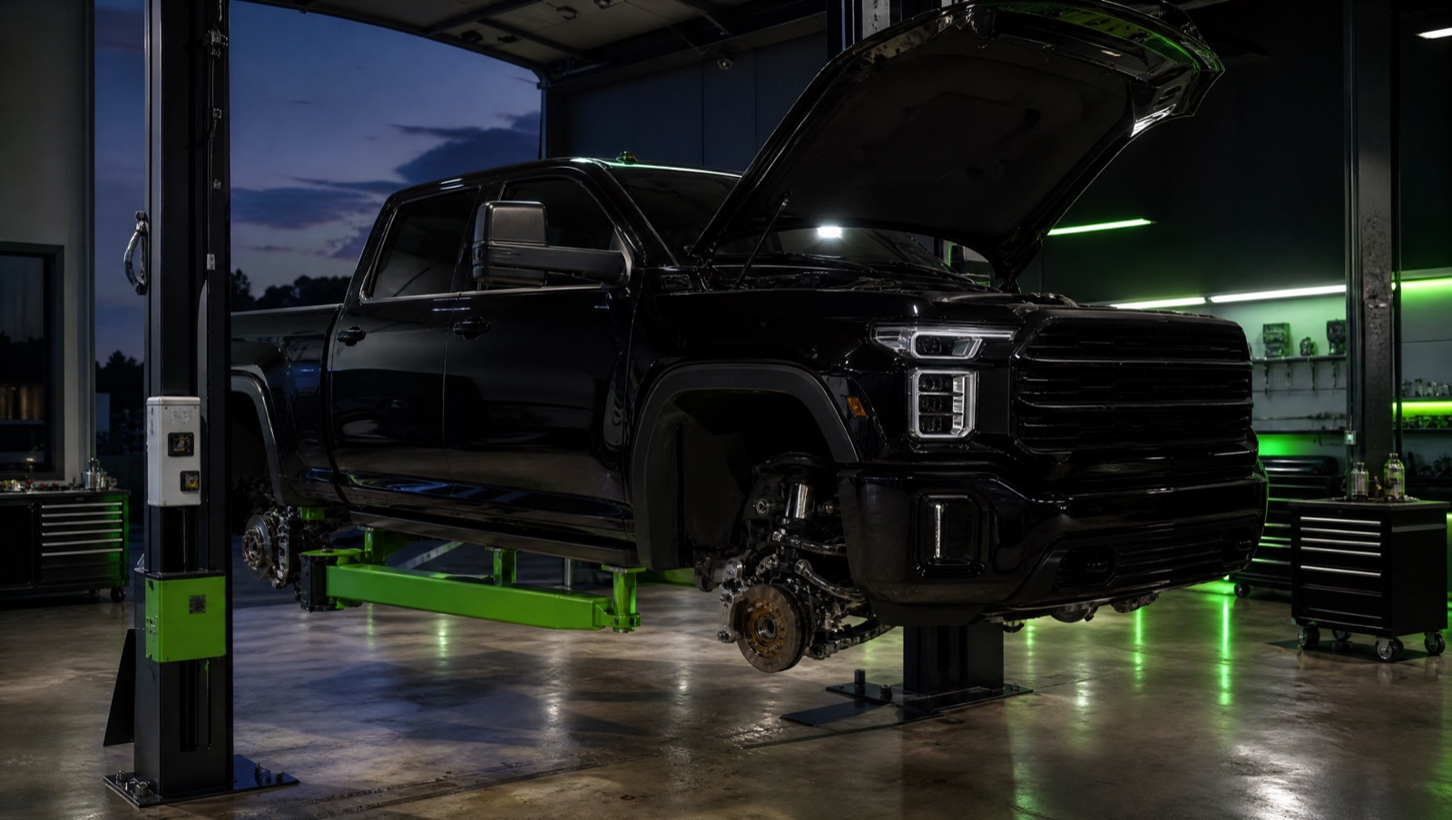 Heavy-duty diesel truck on a lift at Whitty'z Diesel